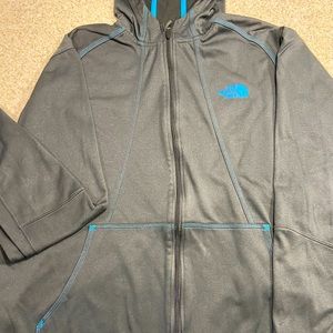 The North Face performance zip up jacket.  Mens XL